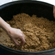 Digested corn, or “bourbon mash” at the Tamworth Distillery is sent off to a local farm after it’s been fermented to produce ethanol.